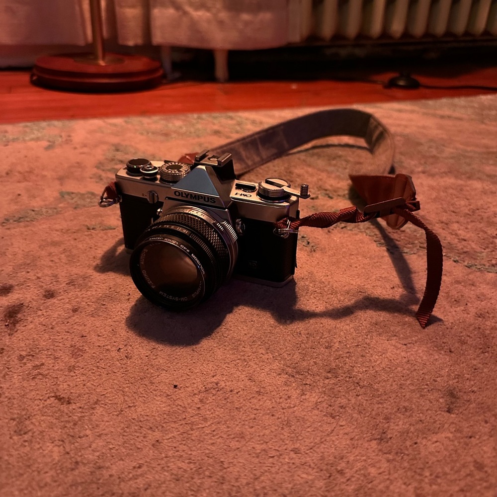 Olympus Silver and Black Camera